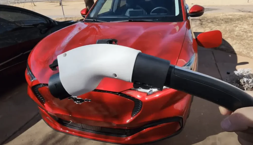 Image demonstrating the proper sequence for using the Lectron Tesla to J1772 Adapter: connecting it to the Tesla charger first, followed by a 30-second wait before linking it to the vehicle, ensuring seamless and efficient charging.