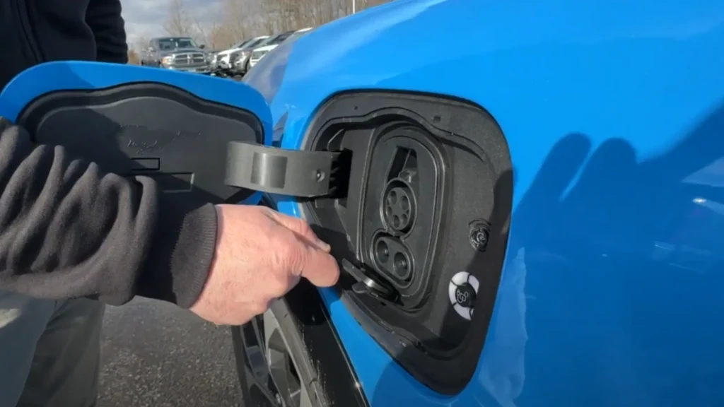 Charging inlet of a Ford Mustang Mach-E, featuring both CCS (Combined Charging System) and Type 2 connectors.