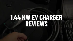 White text "1.44 kW EV CHARGER REVIEWS" over a blurred background showing James holding the cable of a black Lectron Portable Level 1 J1772 WiFi EV Charger.
