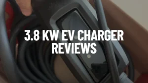 A Schumacher 16 Amp EV Charger with its cable is visible in the background, while the text "3.8 KW EV CHARGER REVIEWS" is prominently displayed in the foreground.