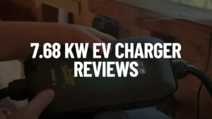 James holds a Battery Tender eCharge 32 AMP EV Charger, with the text "7.68 KW EV CHARGER REVIEWS" overlaid on the image.