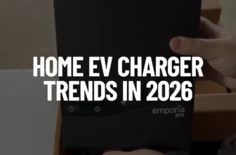 James holding a black Emporia Pro home EV charger with bold white overlay text that reads "HOME EV CHARGER TRENDS IN 2026.